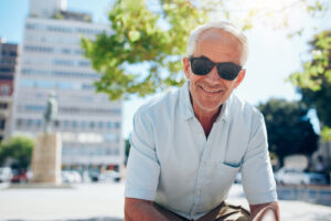 elderly man with sunglasses
